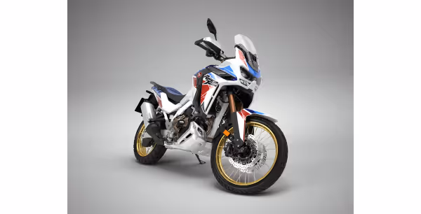 Vista 3/4 frontal direita da CRF 1100L Africa Twin Adventure Sports ES branco perolizado